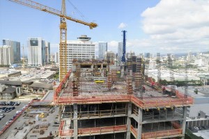 The construction scene at the One Ala Moana ultra-luxury condominium tower being built atop the Nordstrom parking garage at Ala Moana Center.